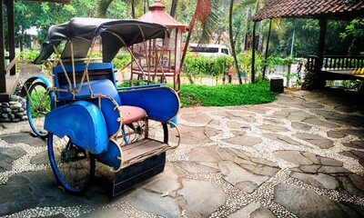 becak classic indonesia, blue pedicap without passengers