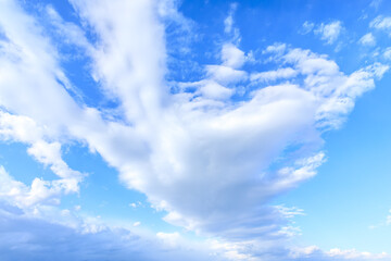 Blue sky and white clouds nature background on a sunny day