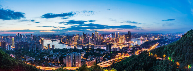Panoramic view of city skyline and modern buildings in Chongqing at dusk, China. Famous travel...