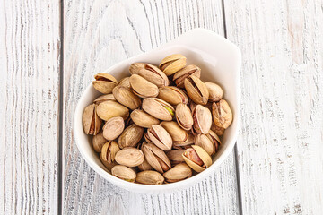 Salted tasty pistachio nuts heap