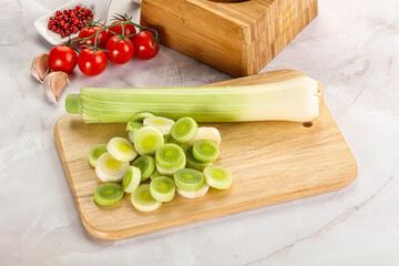 Ripe sliced leek over board