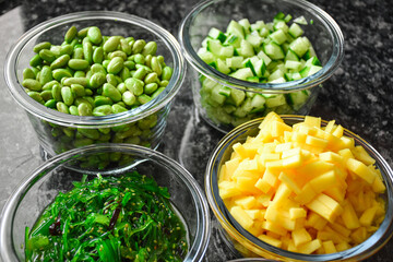 Glass bowls with vegetables and fruits