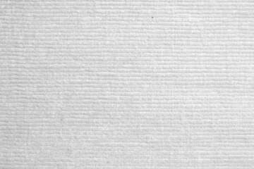 white corduroy fabric texture used as background. clean fabric background of soft and smooth...