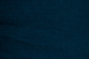 blue corduroy fabric texture used as background. clean fabric background of soft and smooth textile material. cloth, velvet, .luxury navy color tone for silk.