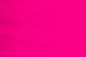 pink corduroy fabric texture used as background. clean fabric background of soft and smooth textile...