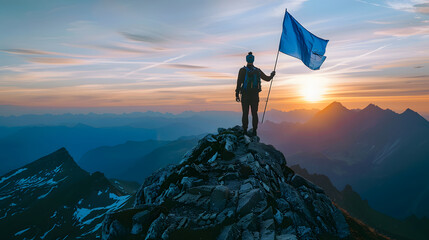 A man stands on a snow-covered mountain peak, holding a blue flag. The sun shines brightly in the background. - Powered by Adobe