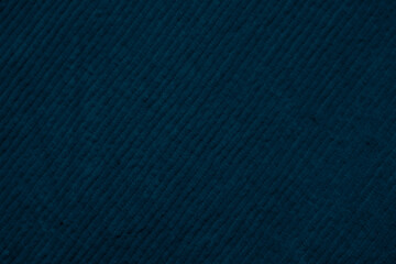 blue corduroy fabric texture used as background. clean fabric background of soft and smooth textile material. cloth, velvet, .luxury navy color tone for silk.