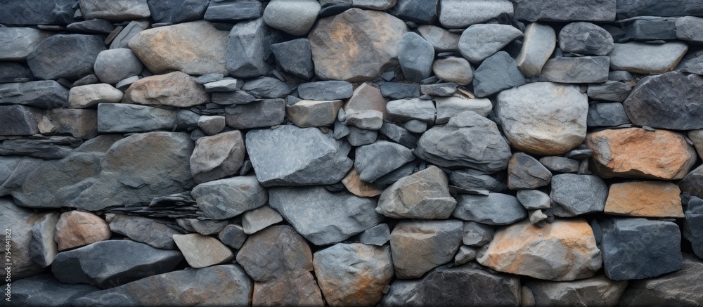 Poster a close-up view of a sturdy stone wall built using rocks and cement, showcasing the texture and dura