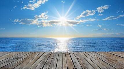 A vibrant stock image of a sunlit ocean viewed from a weathered wooden pier under a clear blue sky.