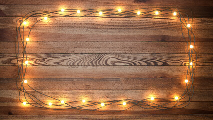 Garland of light bulbs on a wooden background with copy space. 3d illustration