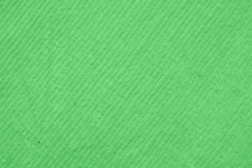 soft light green corduroy fabric texture used as background. clean fabric background of soft and smooth textile material. cloth, velvet, .luxury green pastel tone for silk.