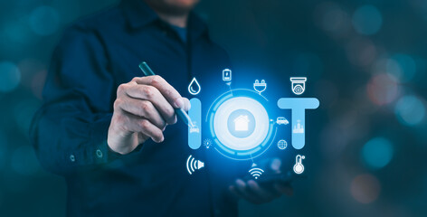 A man pointing to a screen displaying 