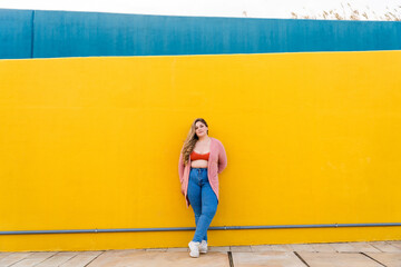 Beautiful plus size young woman outdoors - Confident chubby oversize female model strolling in the...