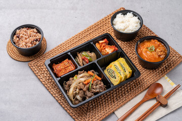 Korean food, pork, stir-fried pork, soybean paste, grilled, webfoot octopus, lunch box, egg roll, side dish, rice, kimchi,