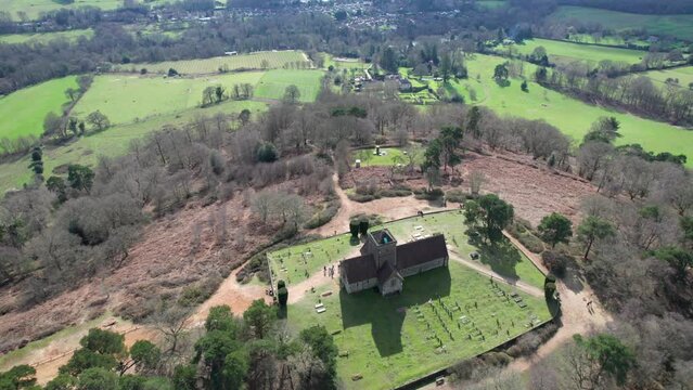 Beautiful aerial view of the St Martha's Church, Historic building in countryside of Guildford, England. Spring outdoor
