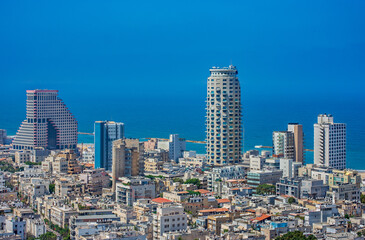 Tel Aviv old buildings, waterfront hotels and Mediterranean Sea.