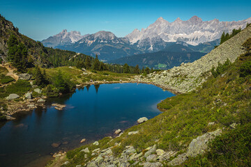 Famous mountain lake and high mountain ridges, Spiegelsee, Austria - 754871086