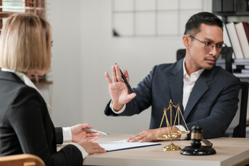 Business and Male lawyers or judge consult having team meetings with clients, Law, and Legal services concept. Customer service good cooperation in office.