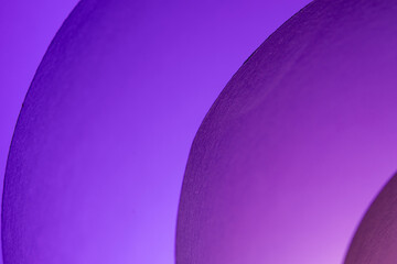 When I roll paper into many circles, I create a background with a sheet of paper and lights made up of different colors.