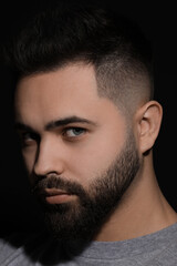 Obraz premium Evil eye. Man with scary eyes on black background