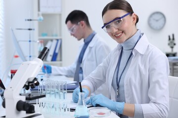 Scientists working with documents in laboratory. Medical research