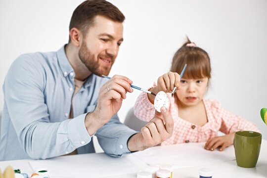 Girl With Down Syndrome Her Father Painting Easter Colored Eggs 3