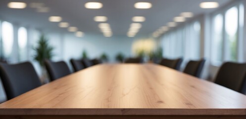 Empty wooden table in a conference room or meeting room on a blurred background - Powered by Adobe