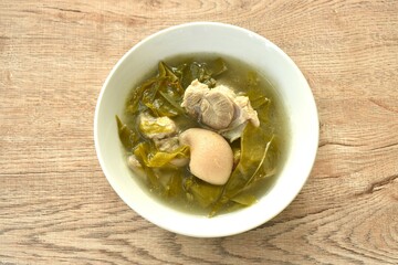 boiled pork leg and belly with cowa leaf soup on bowl