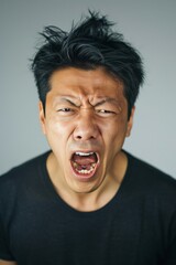 Portrait of angry pensive mad crazy stressed Asian man screaming out (expression, facial), cry girl, beauty portrait of young panic burnout drama