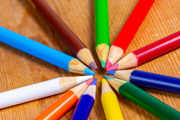 Colored pencils arranged in a circular shape