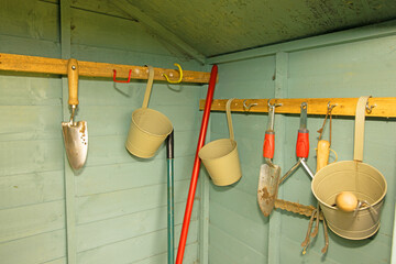 Hanging rail, inside the garden tool shed.