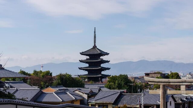 timelapse kyoto city aerial skyline view to ancient Yasaka pagoda building and Kyoto Tower at the back at higashiyama in Kyoto old town city