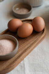 Close-up view of eggs and salt on the dining table