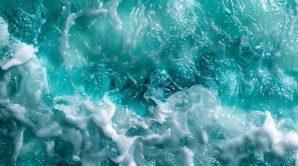 Obraz premium Tranquil Turquoise Waves Crashing with Vigor - Pristine Ocean Texture for Refreshing Backgrounds