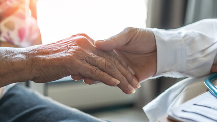 Parkinson disease patient, Alzheimer elderly senior, Arthritis person's hand in support of...
