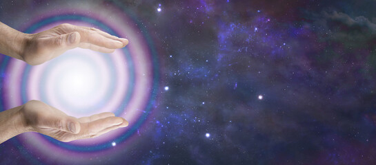 Cosmic spiral distant healing message banner - male parallel hands with a large pink transparent spiral behind and a wide expanse of the dark night sky  with space for spiritual messages
- 754962057