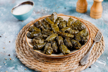 Dolma - stuffed grape leaves with rice and meat.