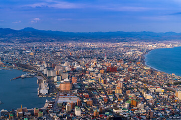 sunset or sun rise of Hakodate cityscape with Skyline and office building and downtown of Hakodate is populars ciy from toursim Hokkaido, Japan with twilight sky in spring season - 754977223