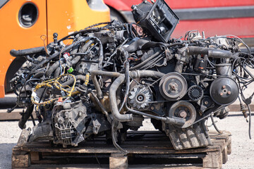 The car engine is for sale at the car disassembly center.
