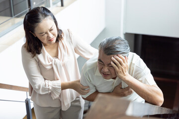 Asian Senior Couple Dealing with stroke, headache, stress, dementia concept; senior couple, husband...