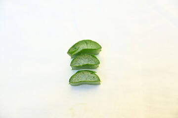 Aloe vera slices. Many Ayurvedic medicines are made using its juice. Its make topical...