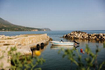 Scenic small pier in Trapezaki Beach in Kefalonia, Greece - 754999693