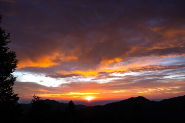Beautiful Colorful Cloudy Sunrise Over Mountains in Boulder, Colorado