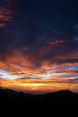 Beautiful Colorful Cloudy Sunrise Over Mountains in Boulder, Colorado