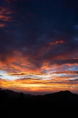 Foto op Canvas Beautiful Colorful Cloudy Sunrise Over Mountains in Boulder, Colorado © Jenna
