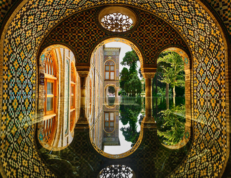 Tehran (Teheran), Iran, 06.24.2023: Arch view of Golestan Palace, iran. Reflection of palace over the mirror.