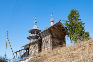 Ancient wooden chapel in honor of the Nativity of the Virgin Mary (1751-1800) on a sunny April day....