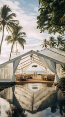 Fototapeta na wymiar Wedding tent for a summer wedding celebration outdoors in a tropical country, a tent among palm trees