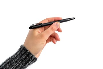 A person is holding a pen in their hand. The pen is black and has a silver tip. The person is wearing a gray sweater