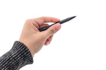 A hand holding a pen with a black tip. The pen is pointed at the camera. Concept of focus and determination